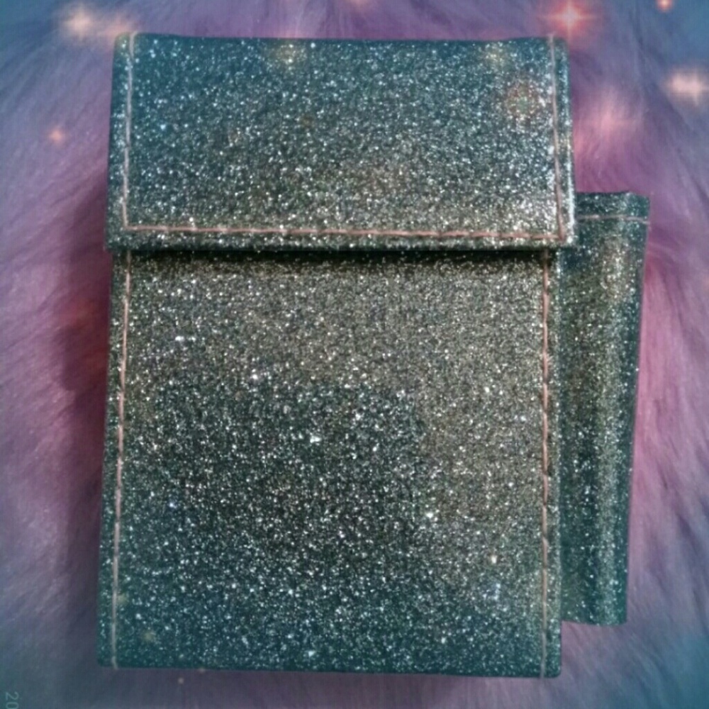 Blue Glitter cigarette case for short cigarettes.